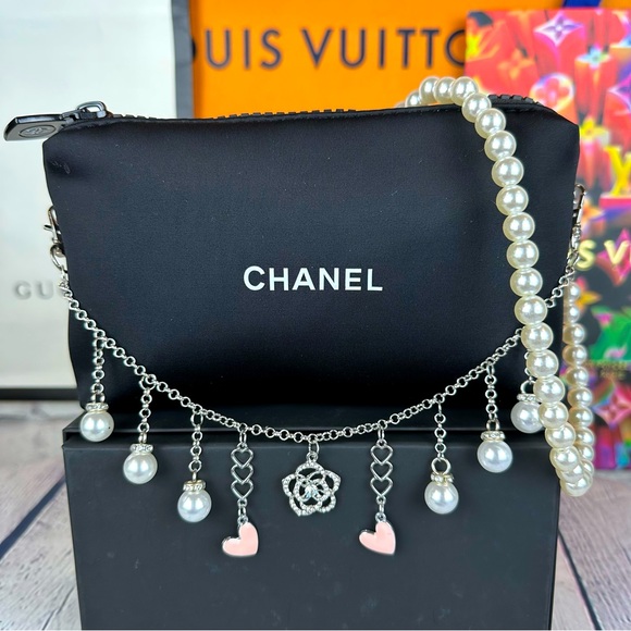 CHANEL black neoprene crossbody pouch with Pearl chain and bag charm - Picture 1 of 11
